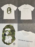Bape x Undeafeated Green Camo Big Ape Logo Tee White